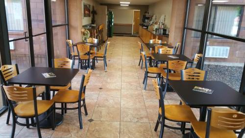 a row of tables and chairs in a restaurant at Inn at the Canyons in Monticello