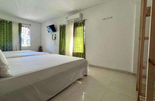 Postel nebo postele na pokoji v ubytování Finca Hotel Villa Manuela