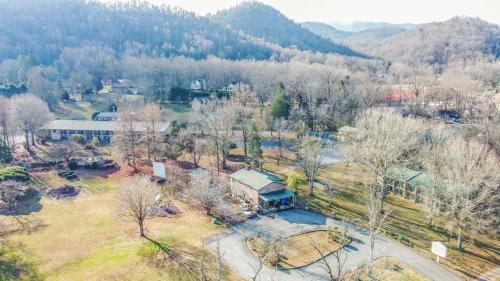 an aerial view of a park with a building and trees at Tremont Lodge & Resort in Townsend