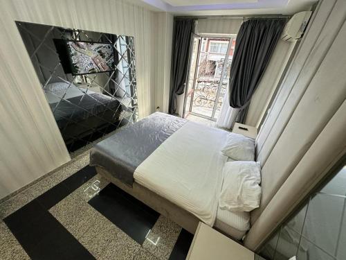 Postel nebo postele na pokoji v ubytování Prestige apart-hotel
