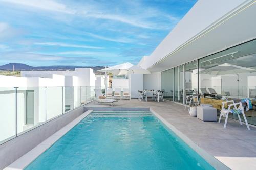 a swimming pool on the roof of a house at Villa Estándar 5 - Casangular by Upper in Adeje