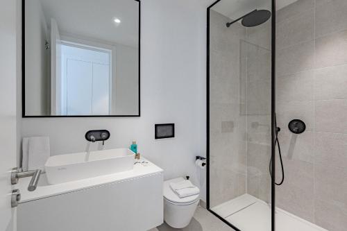 a bathroom with a shower and a toilet and a sink at Villa Estándar 5 - Casangular by Upper in Adeje