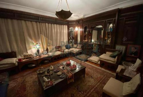 a living room with a couch and a table at La Mark Hostel in Wadi Musa