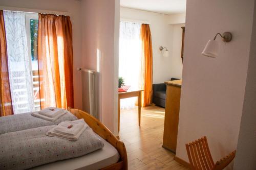 Giường trong phòng chung tại Hotel Malixerhof