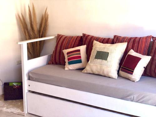 Una cama o camas en una habitación de Cielos de Maimará