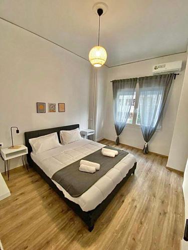 מיטה או מיטות בחדר ב-Comfortable apartment in the city center