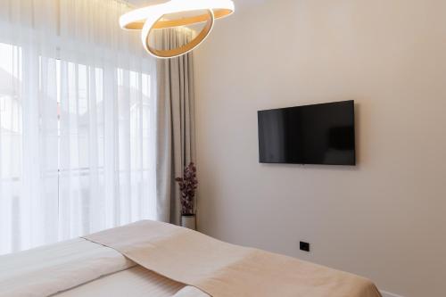 Μια τηλεόραση ή/και κέντρο ψυχαγωγίας στο MM GROUP APARTMENT GOLD