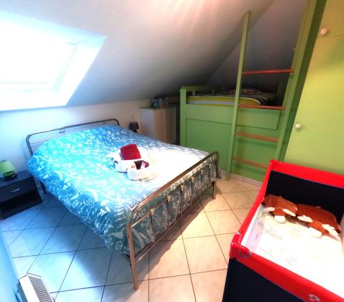 a bedroom with a bed with a santa hat on it at Skyview Suite in Oostduinkerke