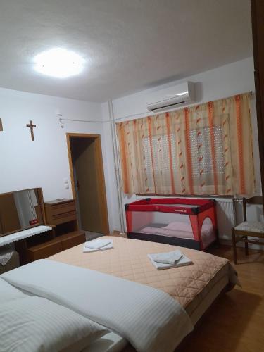 Postel nebo postele na pokoji v ubytování MIR