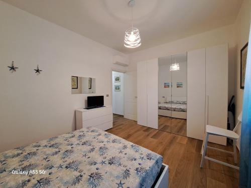 Ένα ή περισσότερα κρεβάτια σε δωμάτιο στο La casetta al mare di Bubi