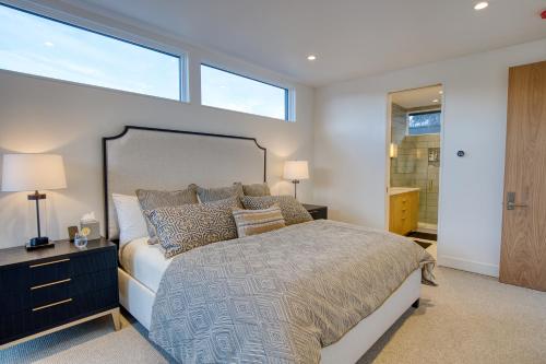 a bedroom with a large bed and a window at Luxe Sun Valley Retreat at River Run in Ketchum