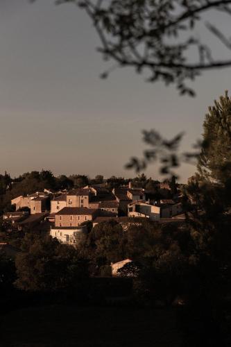 a group of houses on top of a hill at NOUS in Agel