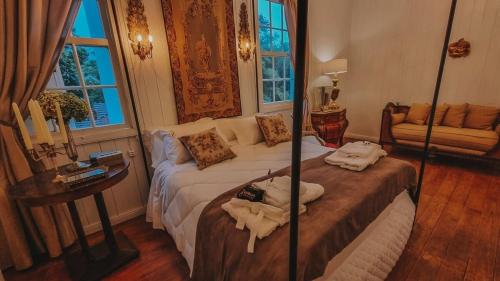 Katil atau katil-katil dalam bilik di Borgo 28 Gramado