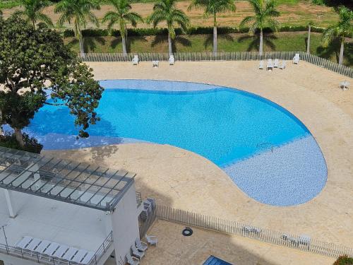 Uma vista da piscina em Encantador Apartamento en Santa fe de Antioquia ou nas proximidades