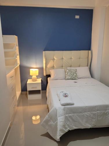 Ένα ή περισσότερα κρεβάτια σε δωμάτιο στο CASA MARIA