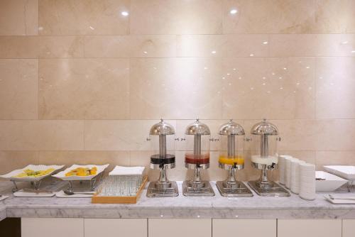 A kitchen or kitchenette at CS Hotel