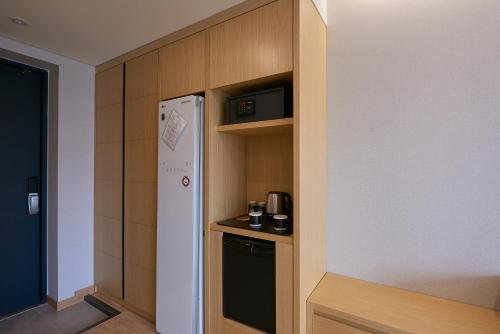 Kuchyň nebo kuchyňský kout v ubytování CS Hotel