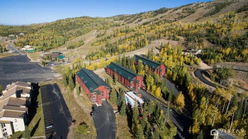an aerial view of a train station in a forest at Giant Steps #43 W Hot Tub, Sauna, And Game Room! in Brian Head
