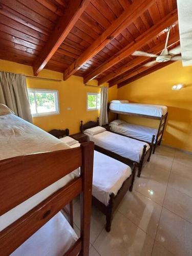 a group of three bunk beds in a room at Dpto 2 dormitorios de Lujo in Bella Vista