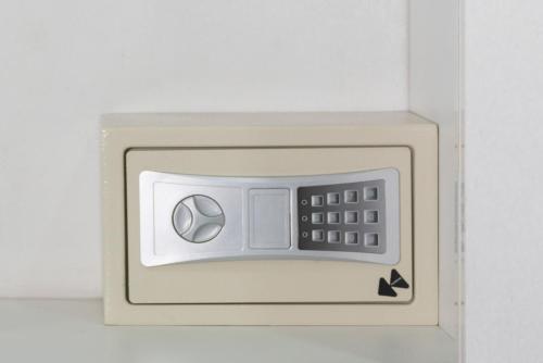 an electrical outlet with a clock on it at Casa Ramos Salamanca - Airport pick up and drop off service - Homestay in Lima