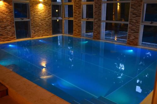 Бассейн в Boutique Hotel & Spa Bosque del Nahuel или поблизости