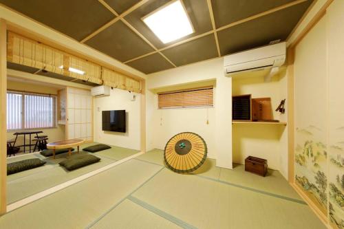 かまどと壺湯之宿 大阪ミナミ–Residence inn Kamado and Tsuboyu-にあるシーティングエリア