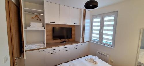 Postel nebo postele na pokoji v ubytování Vila Jahor - Apartman Sofija 9