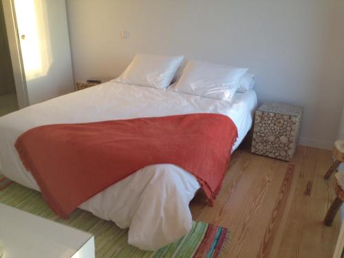 Säng eller sängar i ett rum på Casa das Boticas