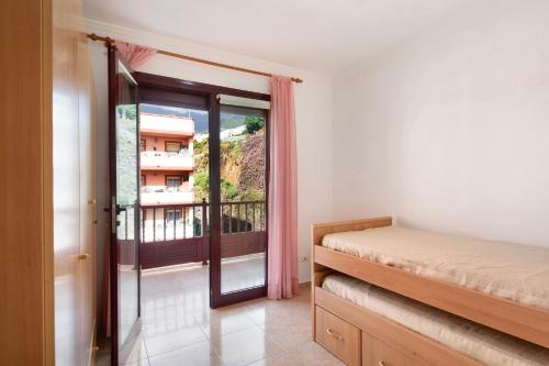 Postel nebo postele na pokoji v ubytování Los Girasoles