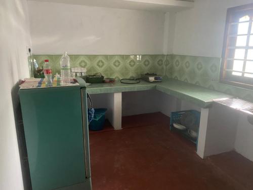 Η κουζίνα ή μικρή κουζίνα στο Rosemary House Kabalana