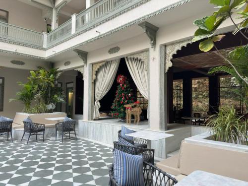 a christmas tree on the porch of a house at Manuscript - Jhilwara Haveli in Udaipur