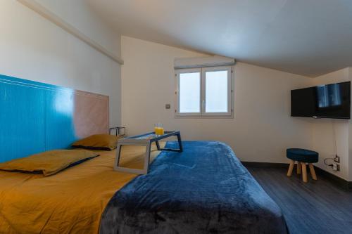 Ένα ή περισσότερα κρεβάτια σε δωμάτιο στο Dionysos