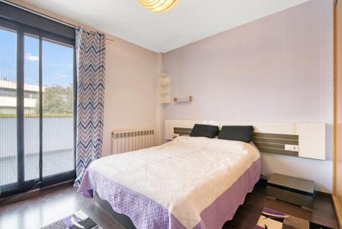 Katil atau katil-katil dalam bilik di Villa del lago