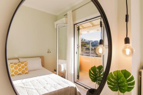 Ένα ή περισσότερα κρεβάτια σε δωμάτιο στο Lallo Living