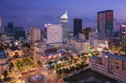 a view of a city at night at Sheraton Saigon Grand Opera Hotel in Ho Chi Minh City
