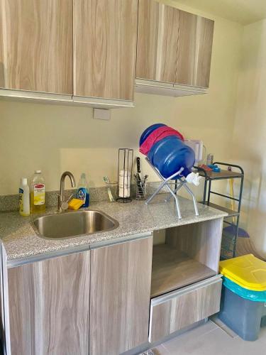 a kitchen with a sink and a counter top at Studio With balcony in Carreta