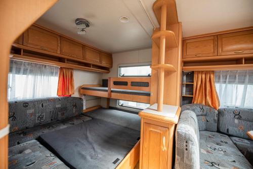an interior view of an rv with two bunk beds at Maszoperia Sun4hel in Jastarnia