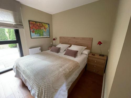 Un pat sau paturi într-o cameră la Les Ferreries Saillagouse
