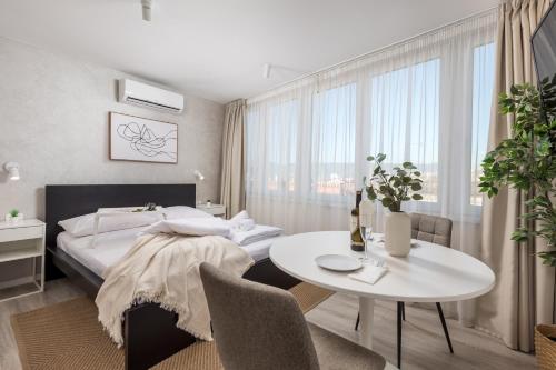 Postel nebo postele na pokoji v ubytování Apartments Penkala