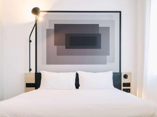 ibis Rouen Centre Rive Droite Pasteurにあるベッド