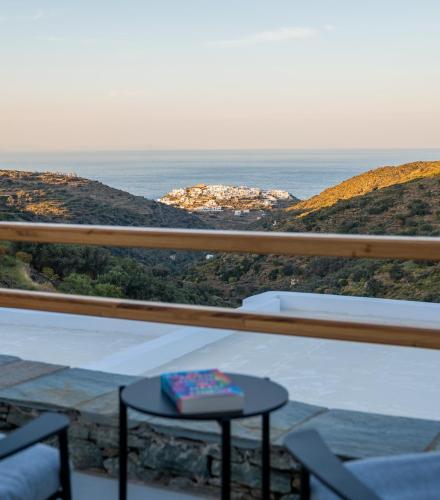 a view of the ocean from a balcony at Sigma Residences Boutique Hotel in Exámbela