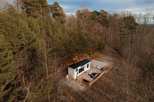 an overhead view of a house in the woods at Tiny Home Big Fun in Knoxville