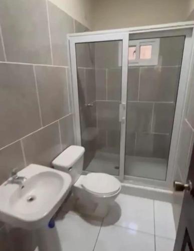 Een badkamer bij Habitación para descansar