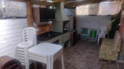 Et tv og/eller underholdning på Casa da Felicidade