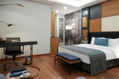 Postel nebo postele na pokoji v ubytování Expoist Hotel