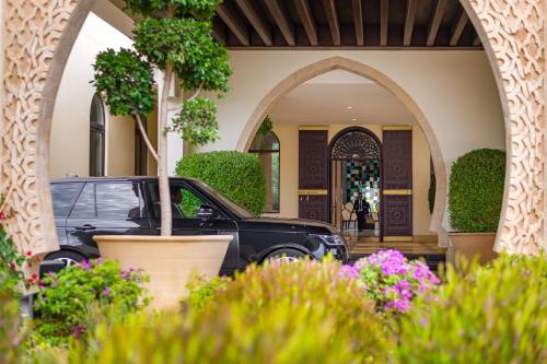 a car parked in front of a house at Fairmont Tazi Palace Tangier in Tangier