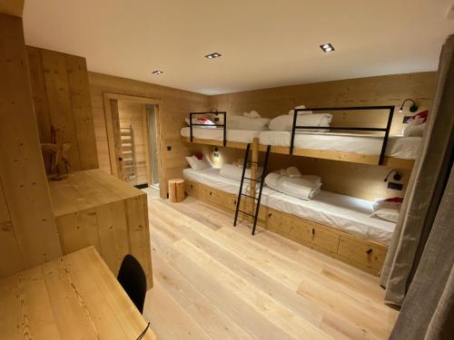 Katil atau katil-katil dalam bilik di Chalet Aguila - Jacuzzi et sauna panoramique - vue spectaculaire