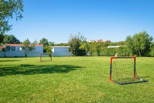 two goal nets in a grassy field at Mobile Homes Rocco 2 in Banjole