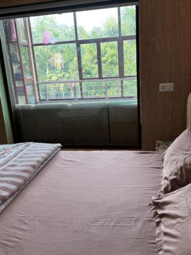 Postel nebo postele na pokoji v ubytování Kaashi Flora - Luxury 3BHK