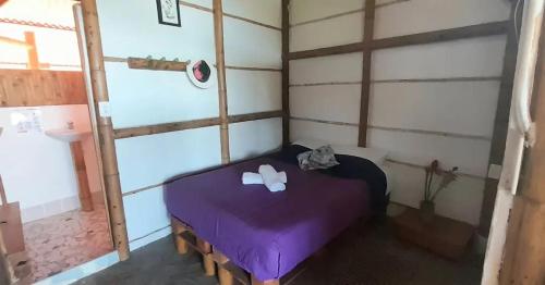 Cama o camas de una habitación en El Eden Minca